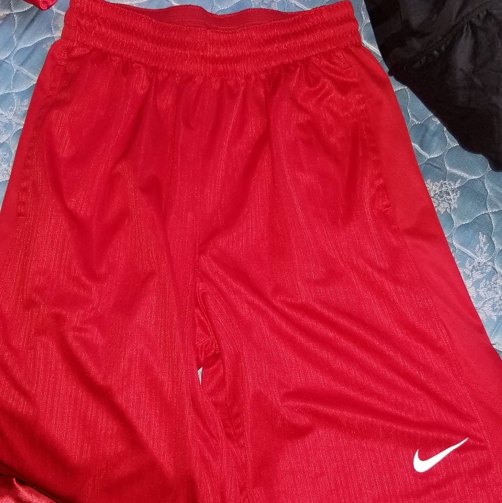 Red nike shorts